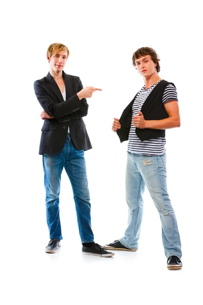 Teenager pointing on his friend. Isolated on white — Stock Photo, Image