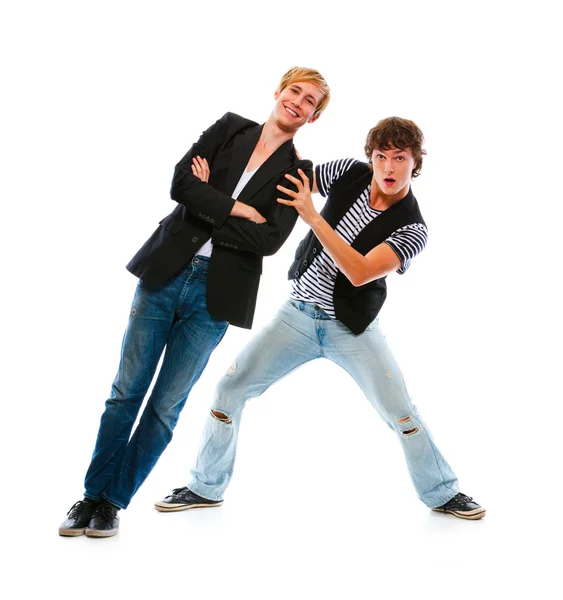 Dwie nastoletni chłopcy świetnie się bawią. na białym tle — Zdjęcie stockowe