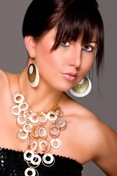 stock image Charming young lady with beautiful jewelry. Retouched