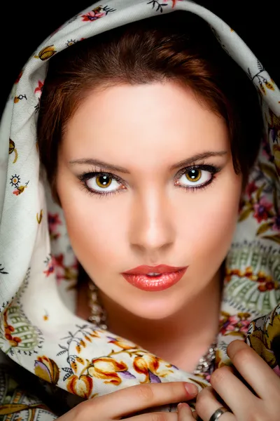 Portrait of beautiful girl with old russian shawl on head. Retouched — Stock Photo, Image