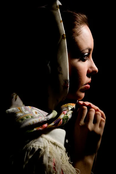 Portrait of young girl with old russian shawl on head. — Stock Photo, Image