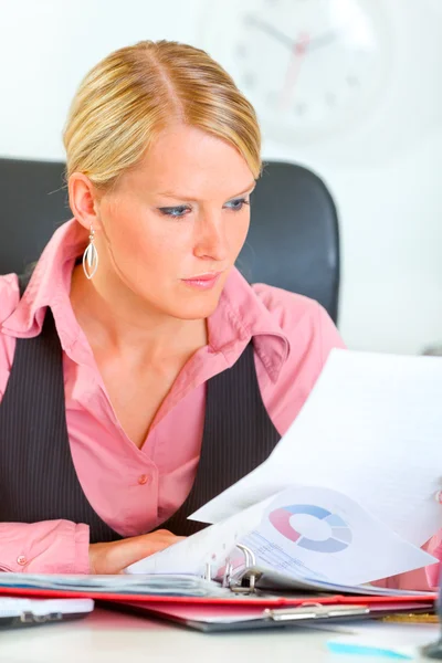 Modern business woman working with documents and checking record — Stock Photo, Image