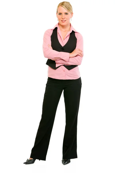Full length portrait of smiling business woman with crossed arms on chest — Stock Photo, Image