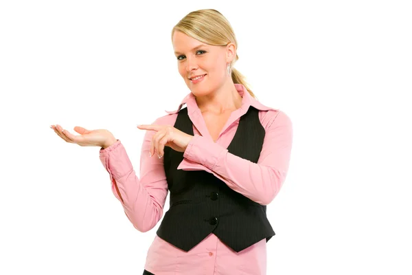 Lächelnde moderne Geschäftsfrau zeigt mit dem Finger auf leere Hand — Stockfoto