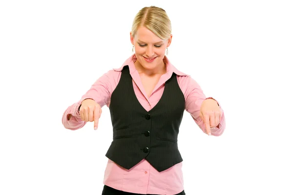 Smiling modern business woman pointing down — Stock Photo, Image