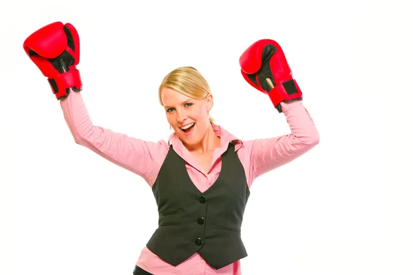 Modern business woman in boxing gloves celebrating victory — Stock Photo, Image