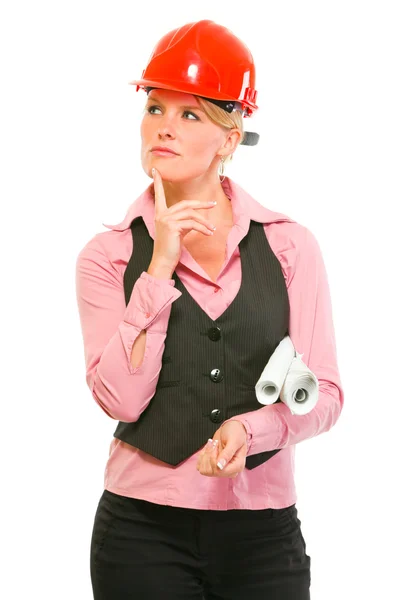 Thoughtful modern architect woman with flip charts looking in co — Stock Photo, Image