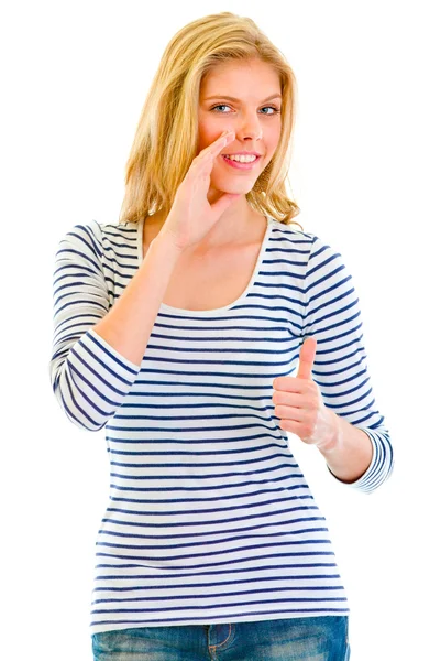Ler vacker tonåring flicka rapportering goda nyheter och visar tummen upp gestu — Stockfoto