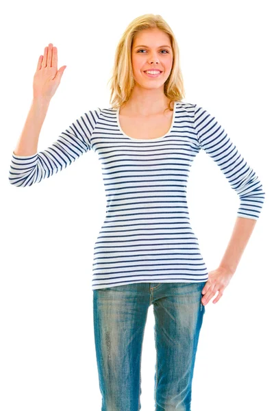 Smiling beautiful teen girl showing salutation gesture — Stock Photo, Image