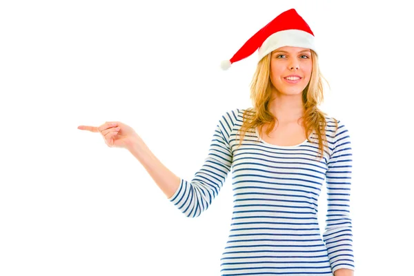 美丽的年轻女孩在指向角的圣诞老人帽子 — 图库照片