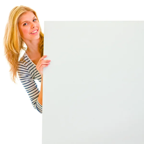 Portrait of teen girl holding blank billboard — Stock Photo, Image