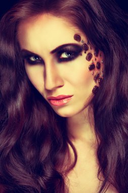 Portrait of mysterious woman with extravagant makeup. Retouched clipart