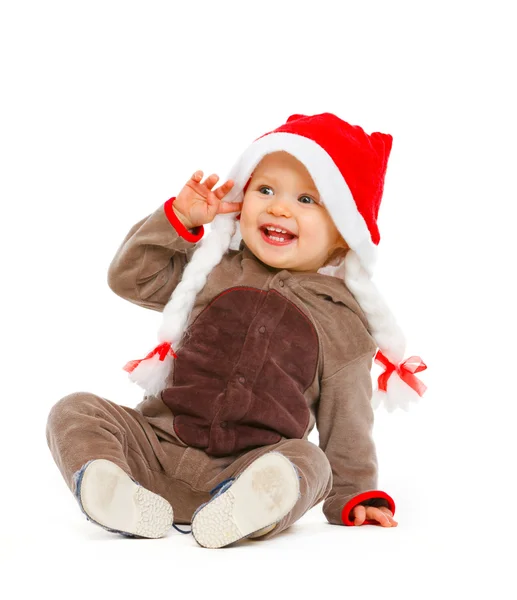 Portret van lachende schattige baby in Kerstman hoed — Stockfoto