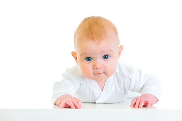 Zainteresowanych czterech miesięcy życia dziecko na brzuchu — Zdjęcie stockowe