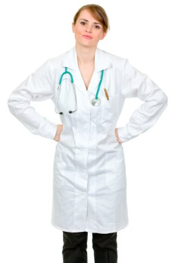 Displeased medical doctor woman holding hands on hips clipart