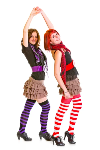Two cheerful young girlfriends dancing for fun — Stock Photo, Image