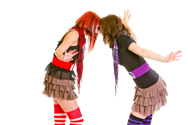 Due giovani ragazze allegre abuting fronti — Foto Stock