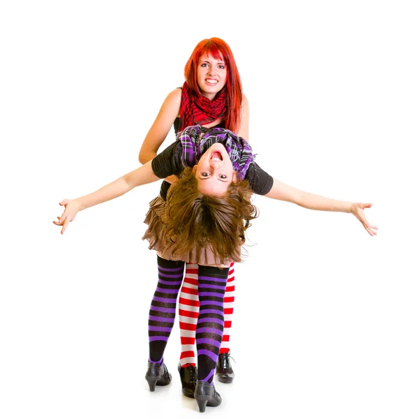 Two jaunty girlfriends funny embracing — Stock Photo, Image