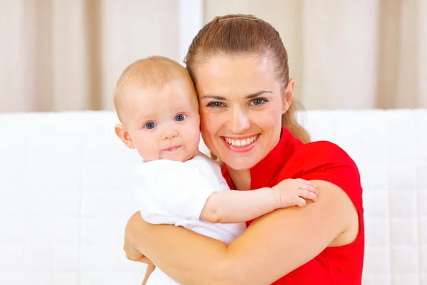 Portrait of lovely baby and young mother — Stock Photo, Image