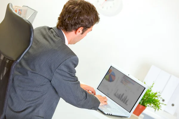 Modern businessman working on laptop — Stock Photo, Image