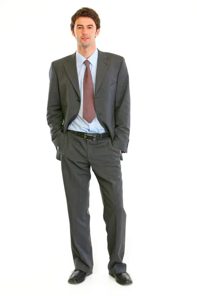 Homem de negócios moderno confiante com as mãos nos bolsos — Fotografia de Stock