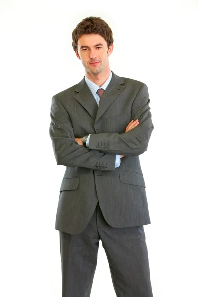 Authoritative modern businessman with crossed arms — Stock Photo, Image