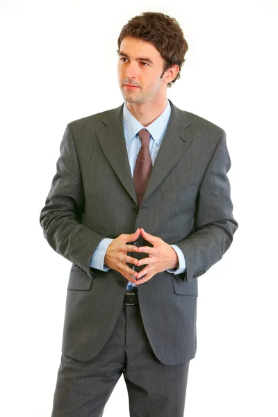 Pensativo homem de negócios moderno olhando no canto — Fotografia de Stock
