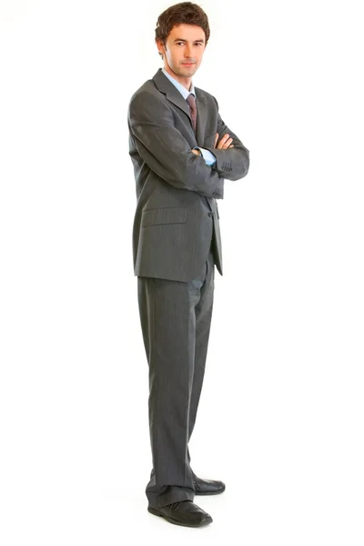Ritratto a figura intera di uomo d'affari serio con braccia incrociate sul petto — Foto Stock