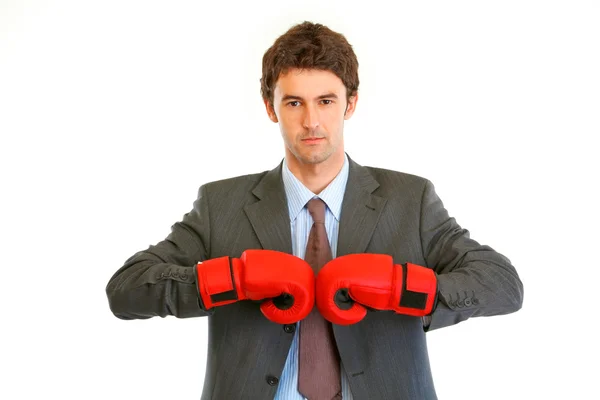 Authoritative modern businessman with boxing gloves — Stock Photo, Image