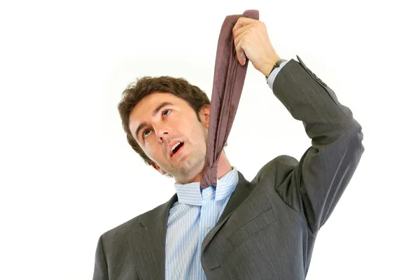 Stressed businessman hanging himself on his necktie — Stock Photo, Image