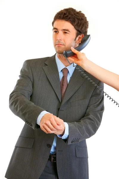 Élégant jeune homme d'affaires parlant au téléphone en main du secrétaire — Photo