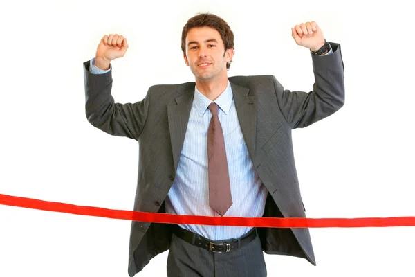 Pleased businessman crossing finish line. Concept - success ach — Stock Photo, Image