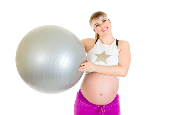 임신 여성 회색 공에 필 라 테 스 운동을 — 스톡 사진