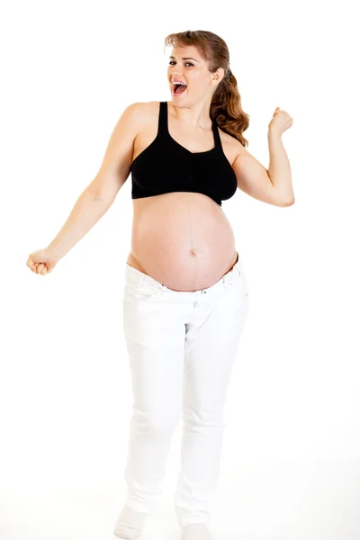 Танцююча красива вагітна жінка ізольована на білому — стокове фото