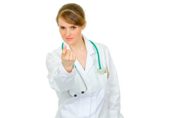 Smiling medical doctor woman ordering to come — Stock fotografie