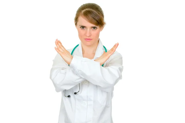 Serious medical female doctor with crossed arms. Forbidden gesture. — Stock Photo, Image