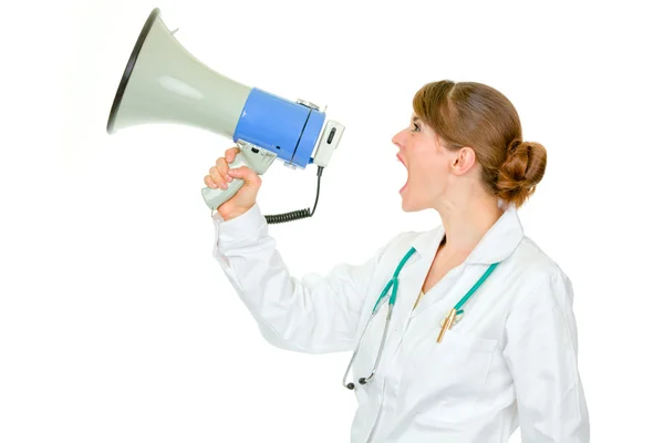 Frustrated medical doctor woman yelling through megaphone — Stock Photo, Image