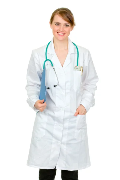 Smiling doctor woman holding medical chart in hand Stock Image