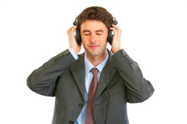 mutlu bir adam iş uygun kulaklıklar müzik dinleme