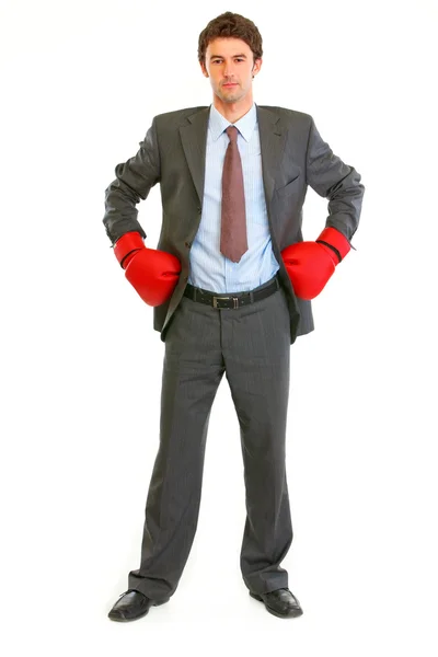 Full length portrait of serious modern businessman in boxing glo — Stock Photo, Image