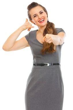 Business woman showing call me gesture clipart