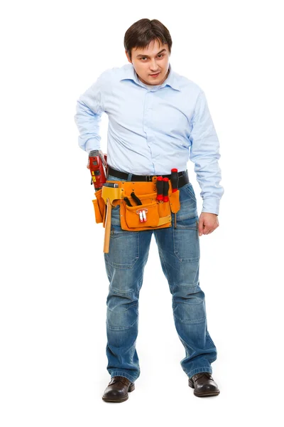 Trabajador de la construcción usando taladro como arma — Foto de Stock