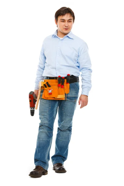 Ganzkörperporträt eines Bauarbeiters, der auf die Seite schaut — Stockfoto