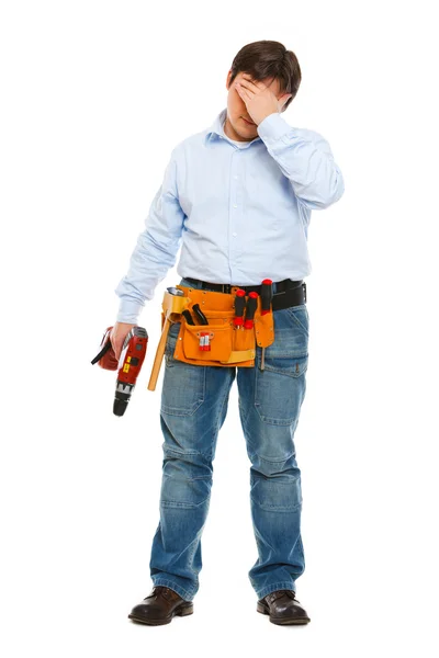 Porträt eines besorgten Bauarbeiters in voller Länge — Stockfoto
