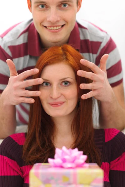 Young man making surprise to girlfriend — Stock Photo, Image