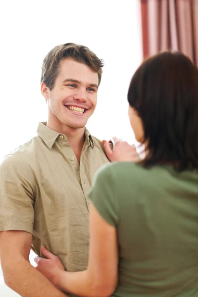 Cheerful couple in love enjoying themselves at home — Stock Photo, Image