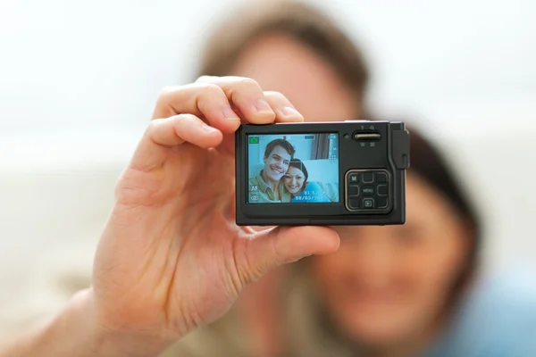 Closeup on camera making portrait of young couple — Stock Photo, Image