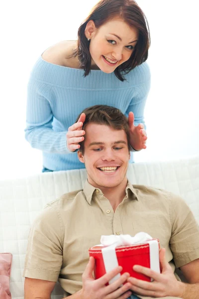 Young woman making surprise to boyfriend — Stock Photo, Image