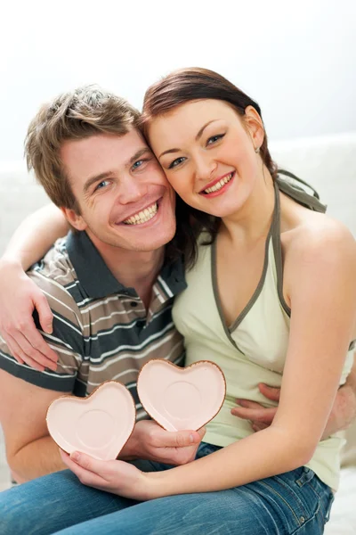 Portrait of couple with Valentines hearts — Stock Photo, Image