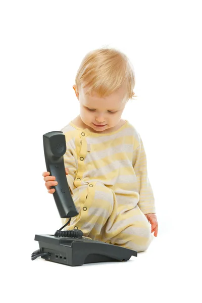 stock image Cute baby with phone on white background